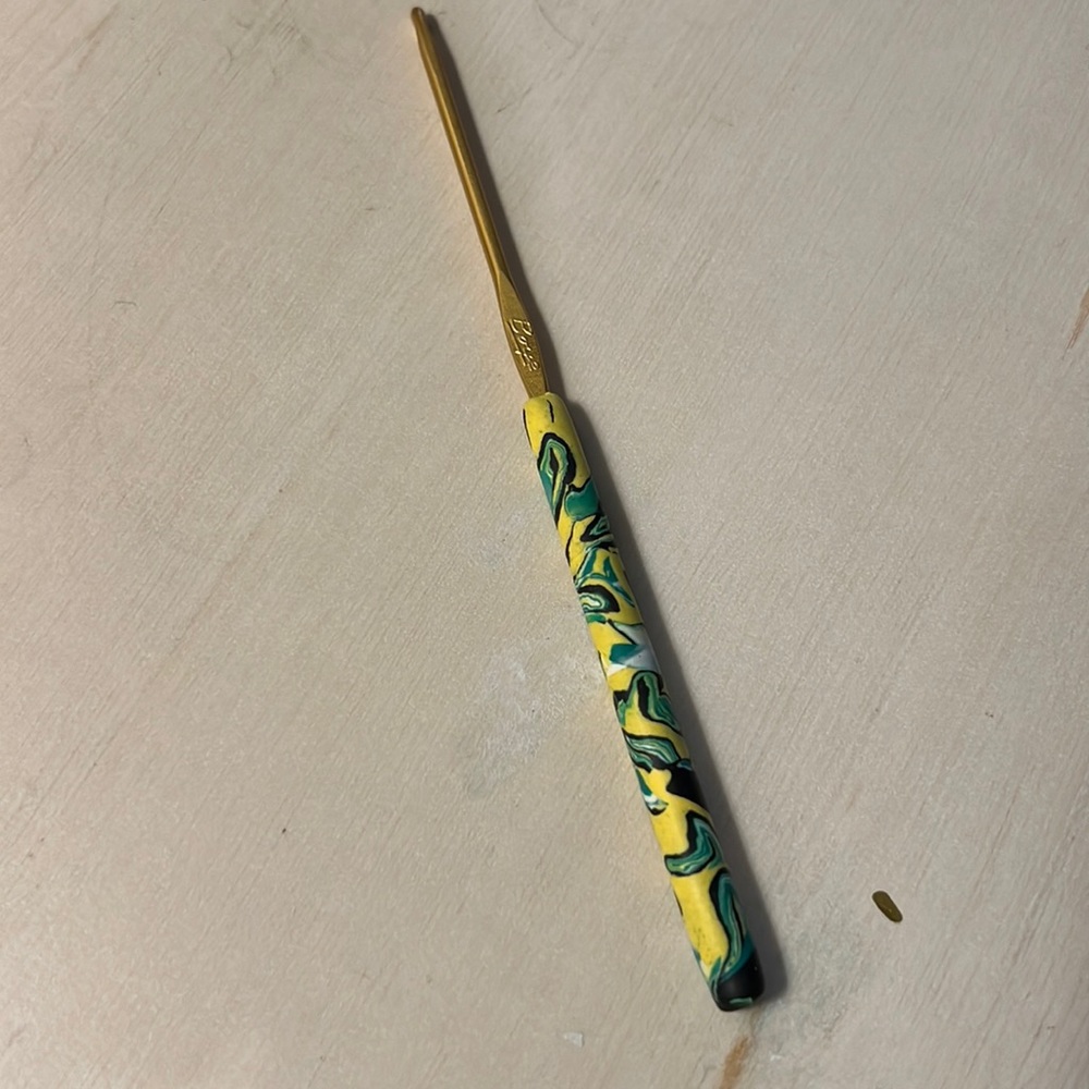 Crochet hook with handmade clay handle